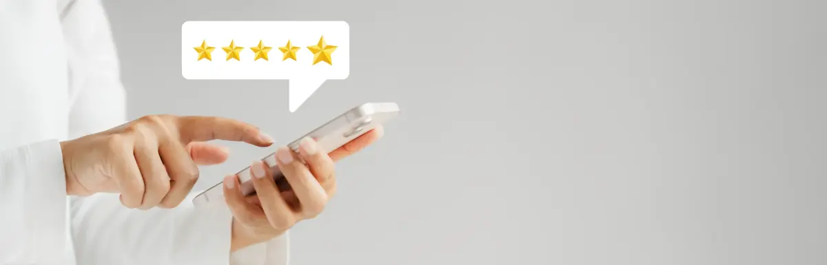Customer providing five-star rating on smartphone for review scraping data collection