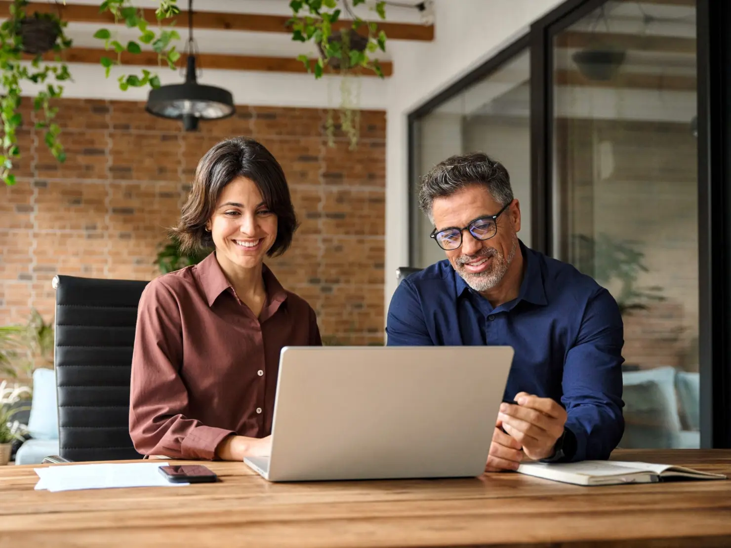 HR professionals collaborating on recruitment strategy using Job Scraping Services