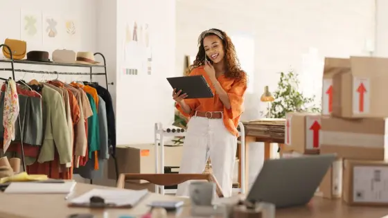 Small business owner using tablet to scrape